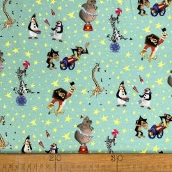 Licensed Jersey - Madagascar Circus -Croft Mill cotton elastane jersey fabric licensed madagascar aqua circus print ruler