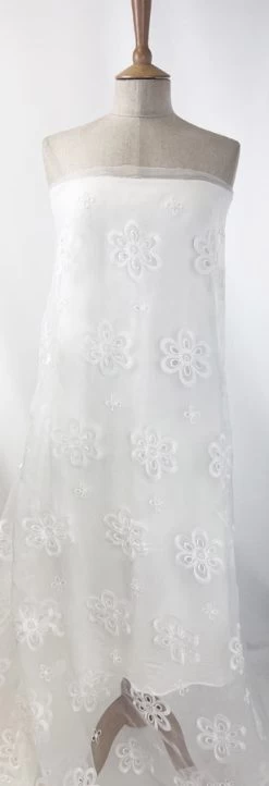 Chloe -Croft Mill cream embroidered polyester dress fabric not too delicate dress