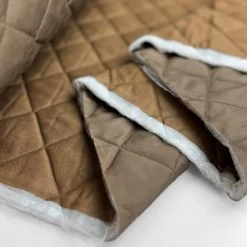 Brassed Off -Croft Mill diamond quilted polyester lined fabric copper brassed off fold