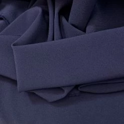 Dynasty - Navy -Croft Mill dynasty navy two way stretch drapey polyester spandex suiting fabric fold
