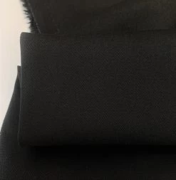 JK - Marmaris - Black -Croft Mill jk mamaris black cotton stretch twilled trousering dress fabric close up weave fabric photo