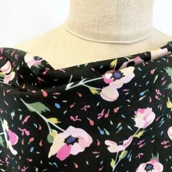 Pima Cotton Lawn - Bloom And Wild - Black -Croft Mill pima cotton lawn bloom and wild black delicate pink floral cream fine cotton lawn dress shirting fabric close up fabric photo