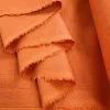 Pure Linen - Orange -Croft Mill pure linen orange dressmaking fabric fold