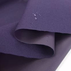 Water Resistant Canvas - Heavy -Croft Mill water resistant canvas heavy purple pu coated water resistant polyester canvas fabric close up fabric photo 1